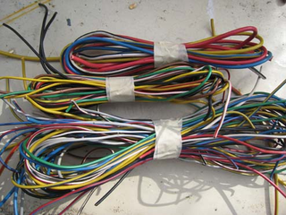 Illustration for article titled Welcome To Low-Budget Race Car Wiring Hell!
